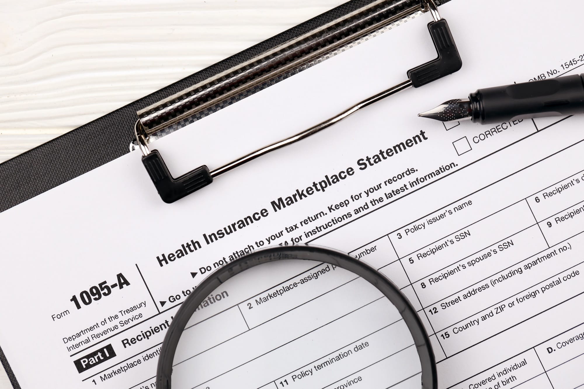 IRS Form 1095-A Health Insurance Marketplace Statement tax blank on A4 tablet